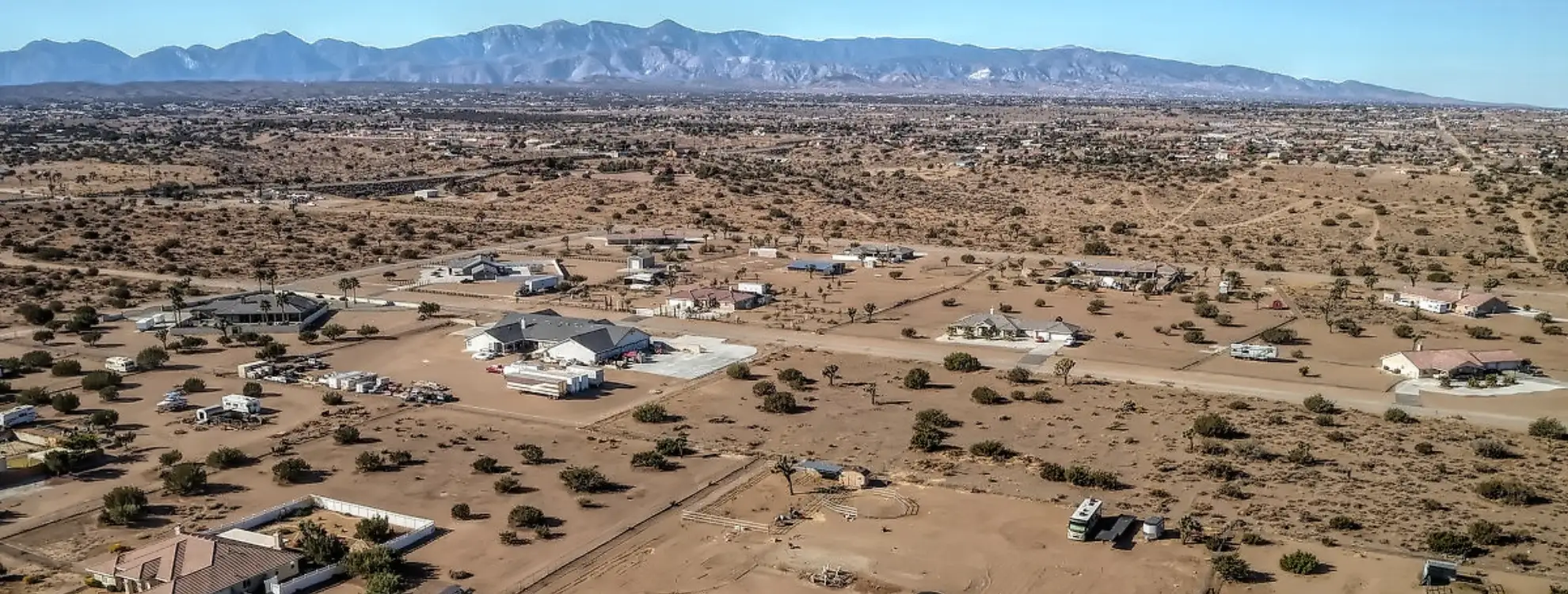 Aerial view of Oak Hills CA Real Estate with custom estates and luxury acreage in the Snowline School District.